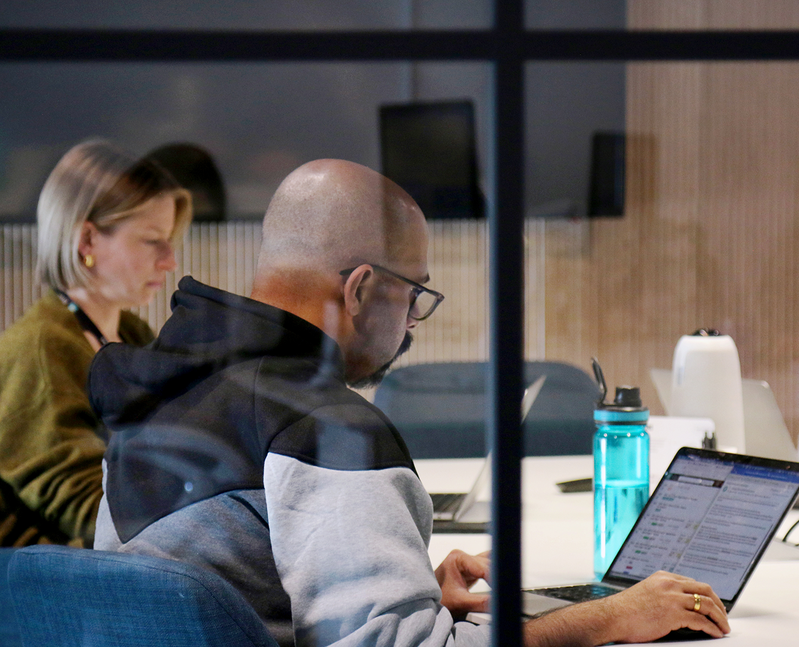 Project and Account Manager reviewing the creative brief.